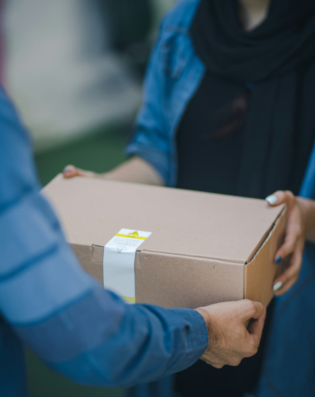 Traveler delivering the pasabuy item to the requester.